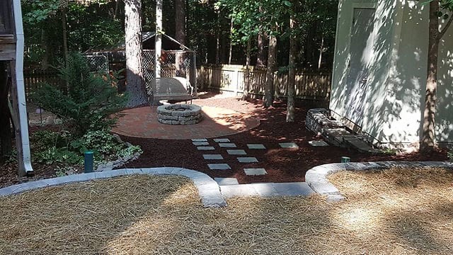 Backyard hardscape pathway and fire pit